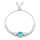 ADJUSTABLE RHODIUM GRADUATED AQUA CZ BOLO STYLE TENNIS BRACELET