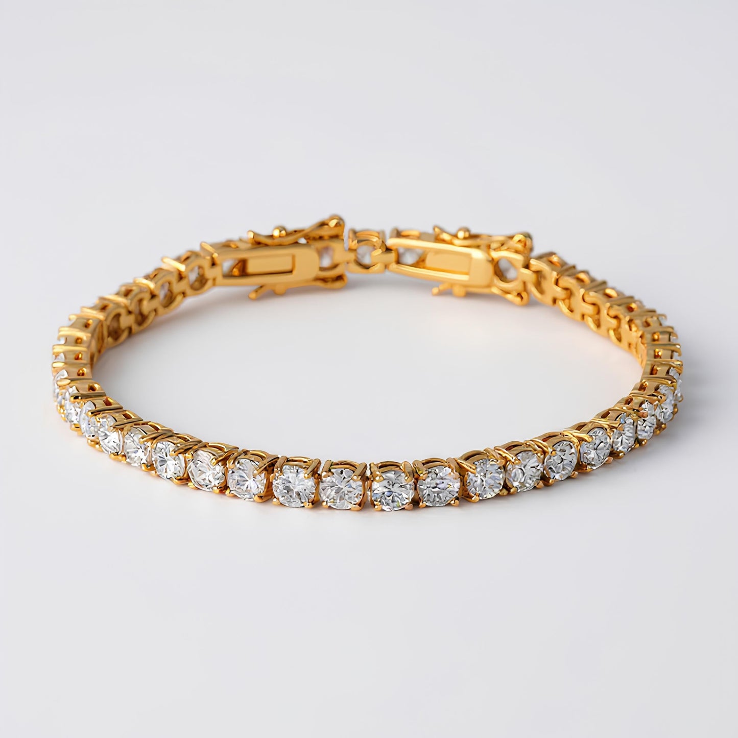 17.6 CT GOLD TENNIS BRACELET WITH SHIMMERING ROUND CZ